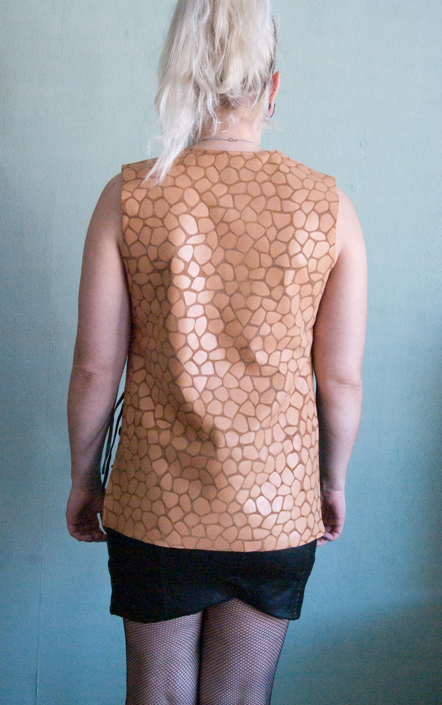 Handcrafted Brown Leather Split Top, with a print of a giraffe