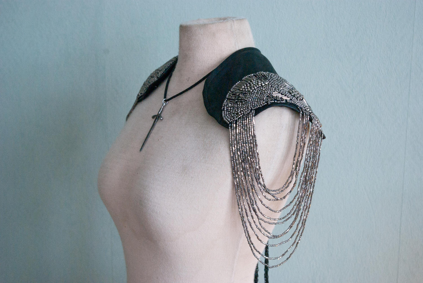 Soft black leather shoulder pauldrons with epaulettes, made of silver beads