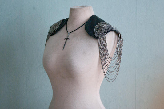 Soft black leather shoulder pauldrons with epaulettes, made of silver beads